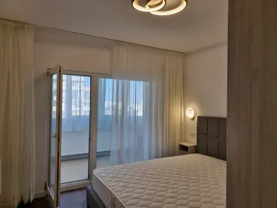 dormitor cu usi glisante inchiriere apartament Sector 3 București